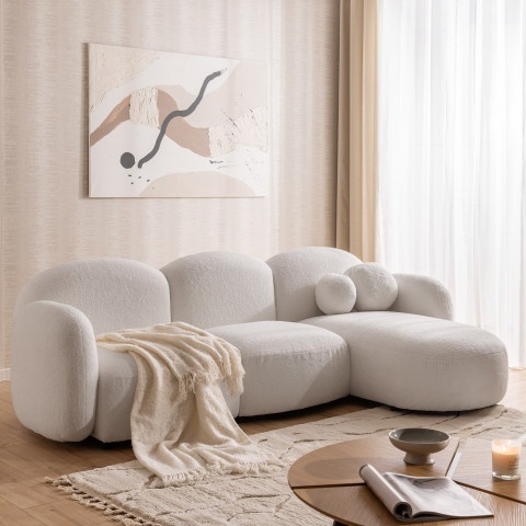 Beżowy narożnik w boucle z ozdobnymi poduszkami Bloop