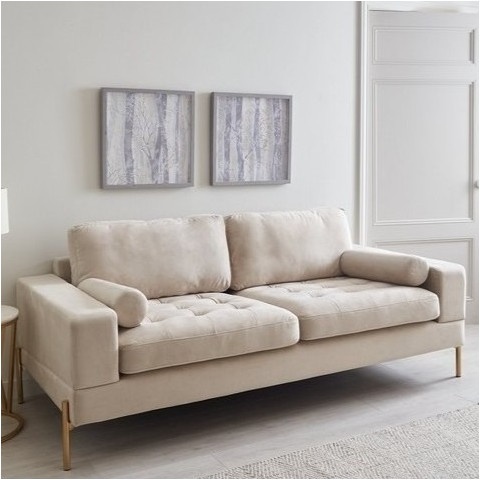 Beżowa sofa dwuosobowa nowoczesna na wysokich nóżkach Volio