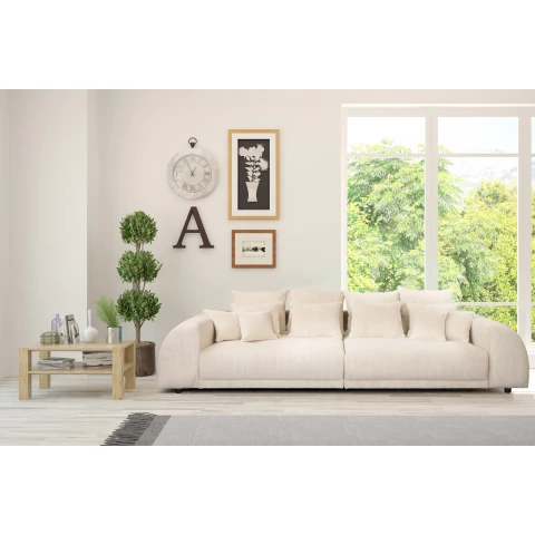 Sofa czteroosobowa Noemi – beżowy sztruks, wygodna, z poduszkami, idealna do salonu
