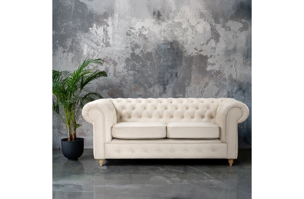 Sofa dwuosobowa pikowana Chesterfield z funkcją spania Fins - design i funkcjonalnosc w parze