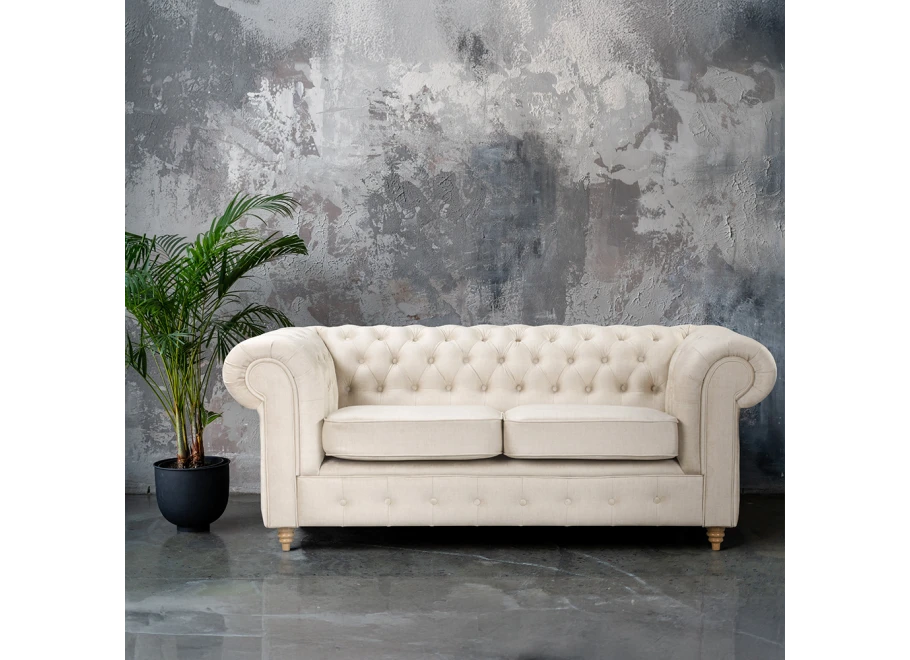 Sofa dwuosobowa pikowana Chesterfield z funkcją spania Fins
