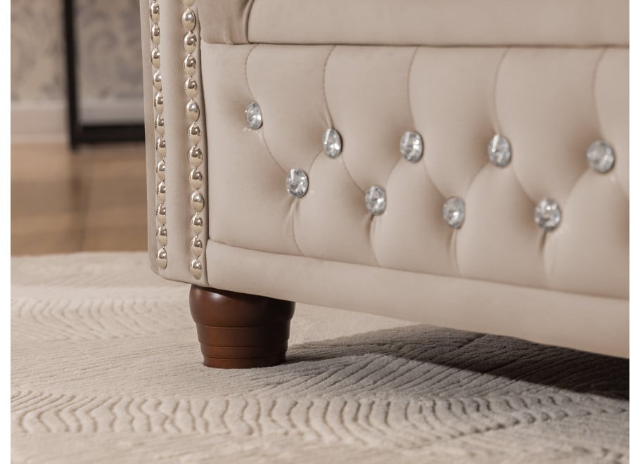 Beżowa sofa z kryształkami Felix Blink z funkcją spania pikowana Chesterfield - Riviera 21